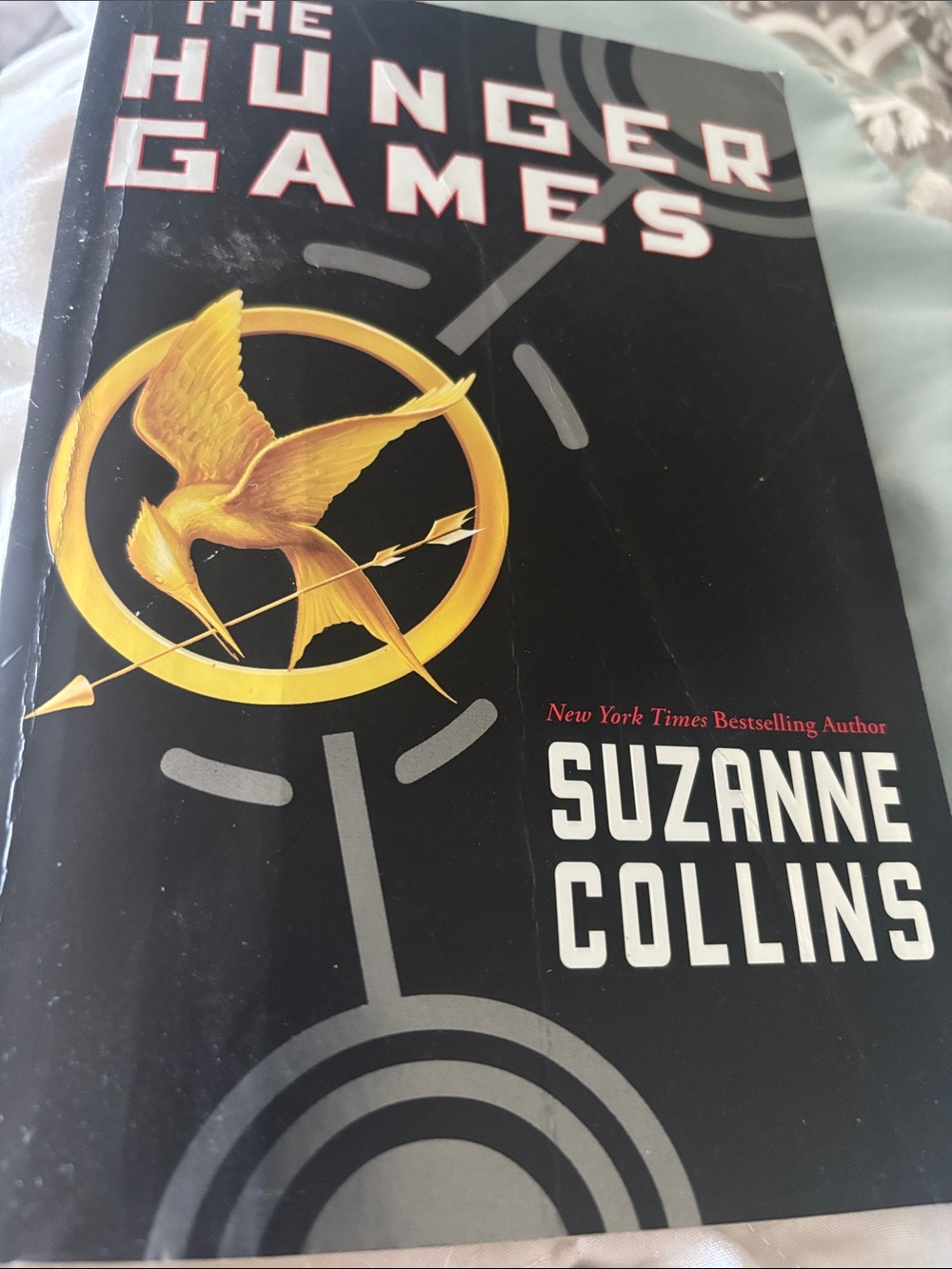 The Hunger Games Paperback - first  in a dystopian young adult trilogy.